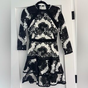 Alexis Lace Black and White never worn dress